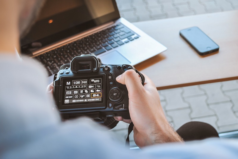 man holding a camera